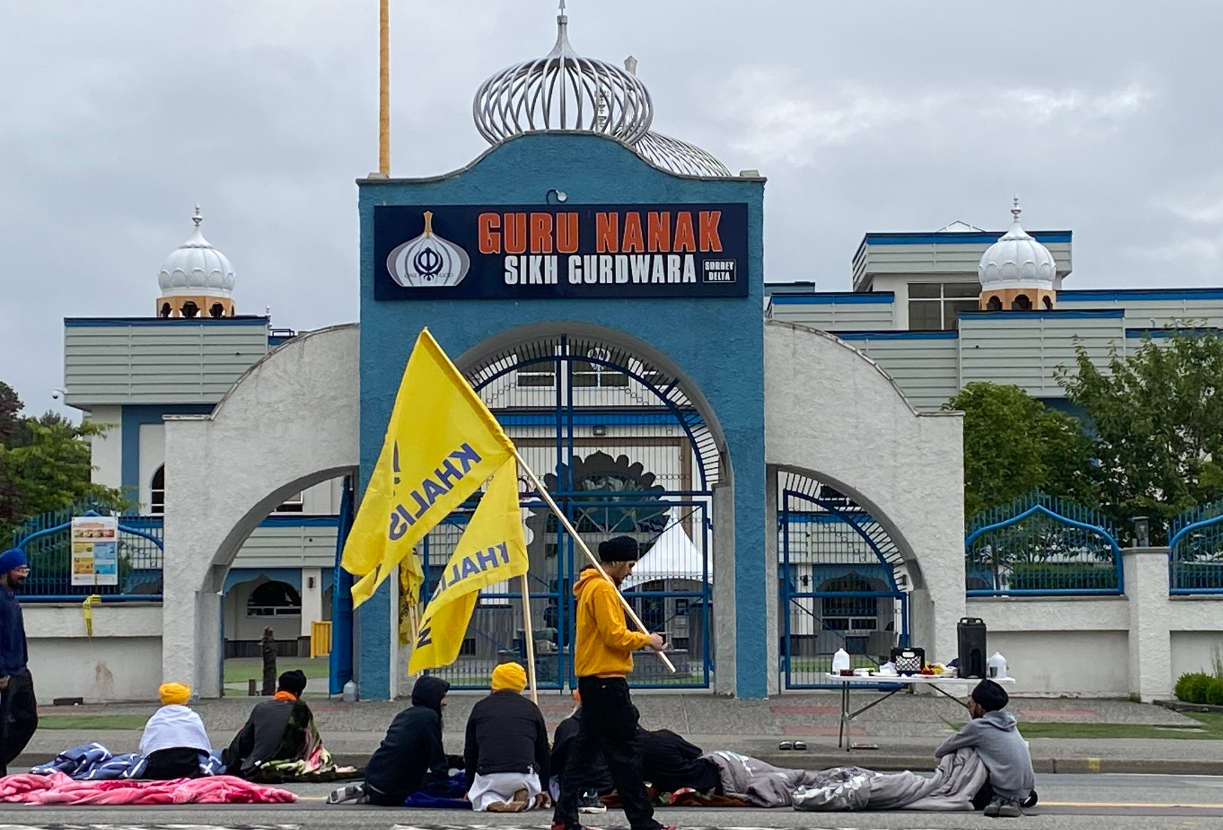 Mourners gather outside the Guru Nanak Sikh Gurdwara in Surrey Monday, June 19. (CityNews / Mike Lloyd)