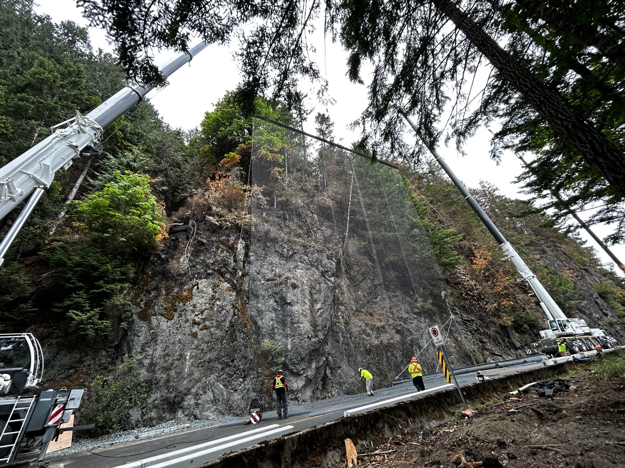 Crews repairing Highway 4 with machinery.