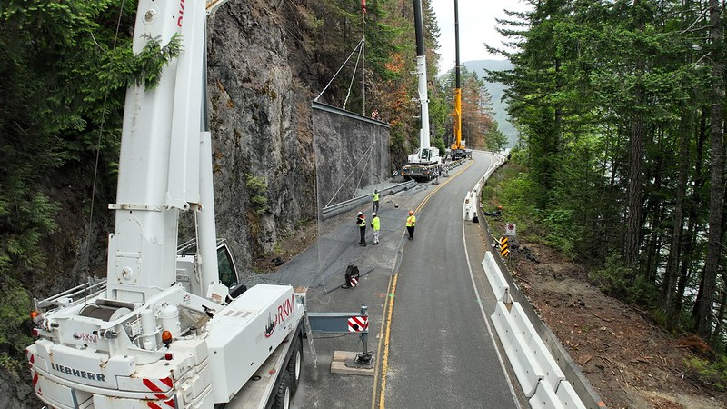 Crews on Vancouver Island work to install safety features along Highway 4, which was shut down because of a wildfire