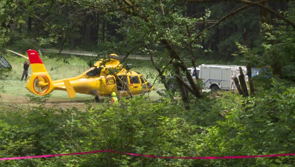 A helicopter gets ready to take off in Golden Ears Park