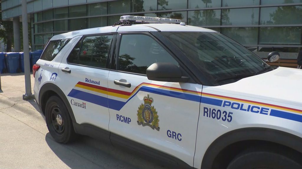 A RCMP cruiser is seen from the side