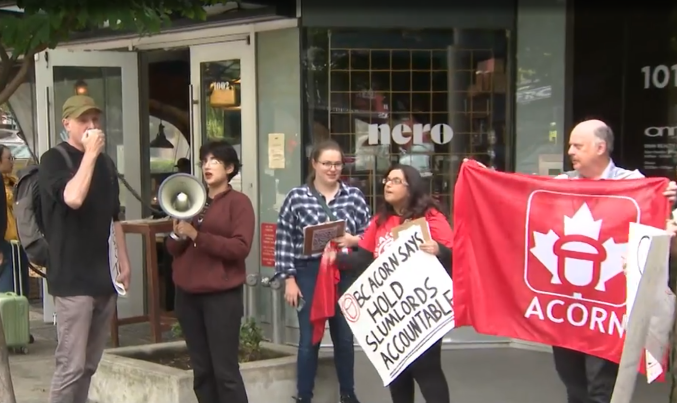 Protesters with ACORN gather outside a Vancouver real estate developer's office to call for changes to help renters