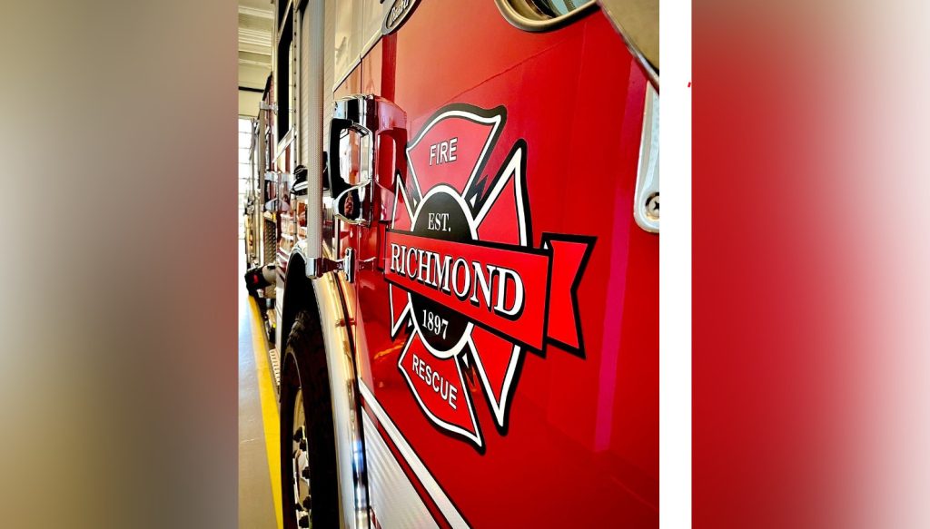 a red fire truck with the logo of the richmond fire departement