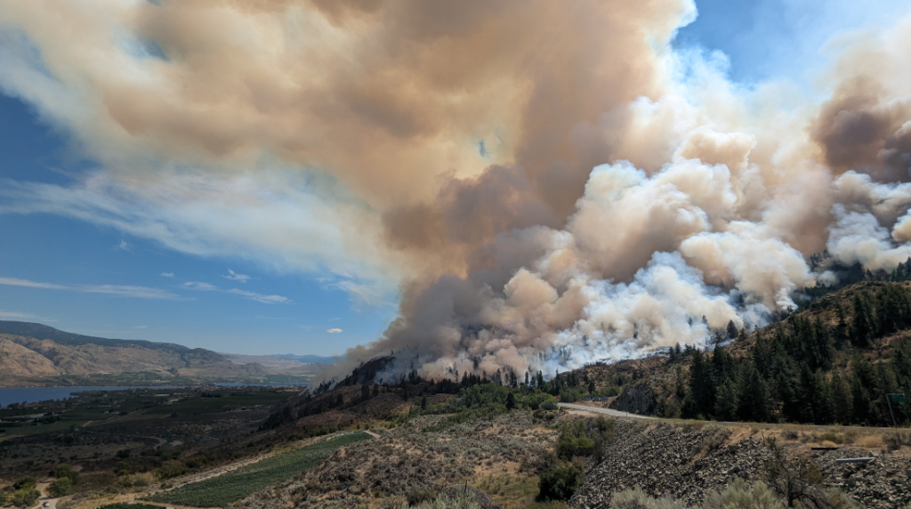 Smoke rises from the Eagle Bluff wildfire near Osoyoos in early August