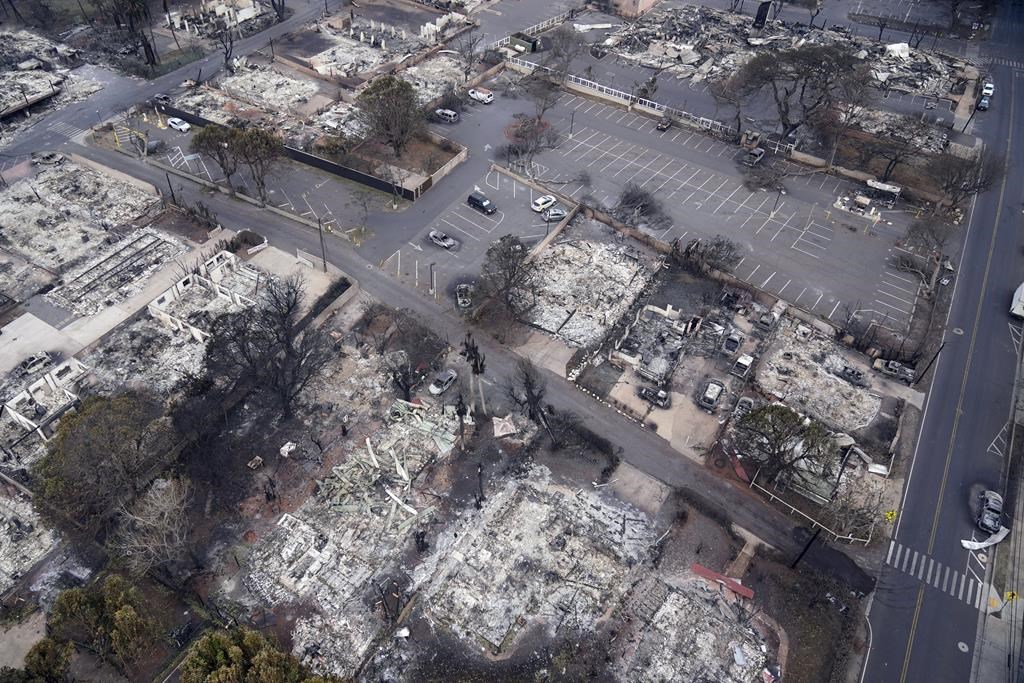 Wildfire wreckage is seen Thursday, Aug. 10, 2023, in Lahaina, Hawaii