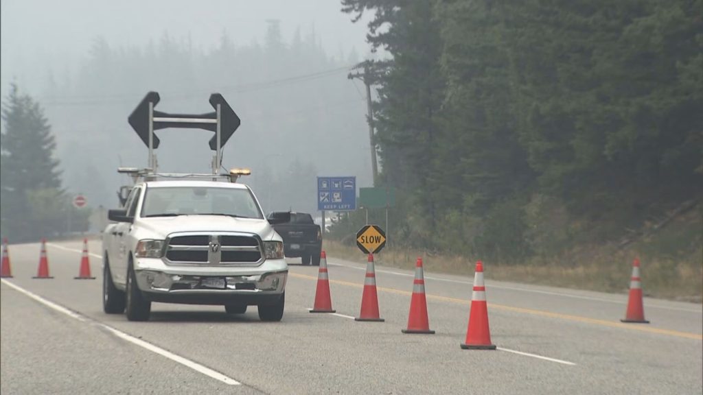 Highway 1 is seen, blocked by cones and road closed signs