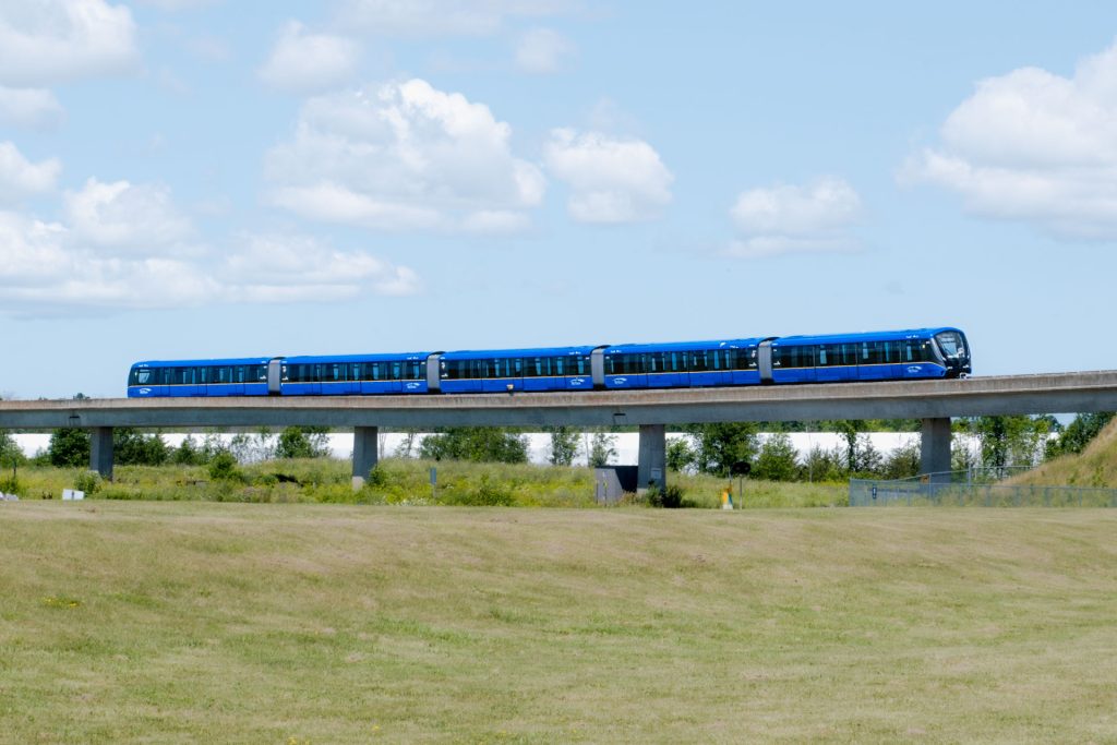 TransLink's new Mark V SkyTrain cars make their way across a test track in Kingston, Ontario.