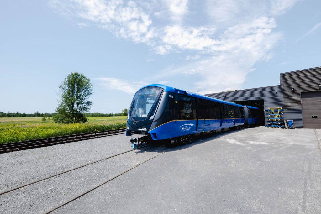 TransLink's new Mark V SkyTrain cars make their way across a test track in Kingston, Ontario.