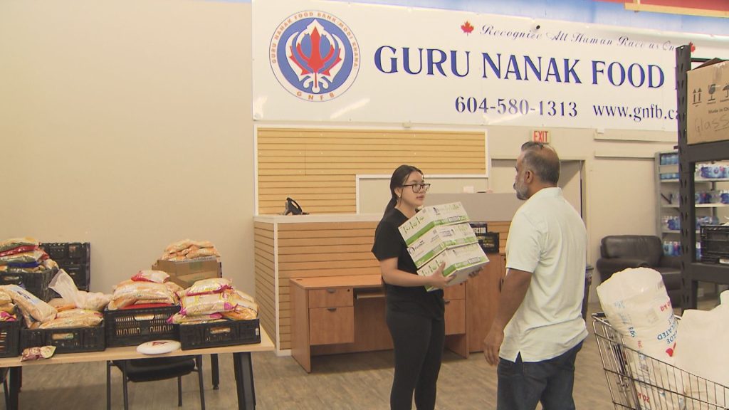 A team at Guru Nanak Food Bank preparing supplies to be sent to wildfire evacuees in B.C.'s Interior. 