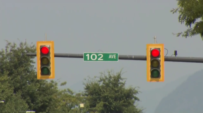 King George Boulevard and 102 Avenue.