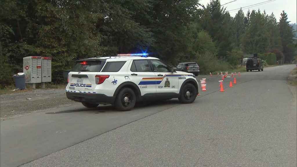 An RCMP cruiser blocks a crime scene in Mission