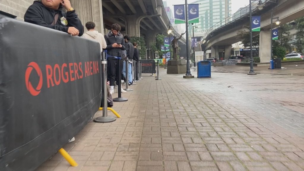 Drake fans wait outside of Rogers Arena