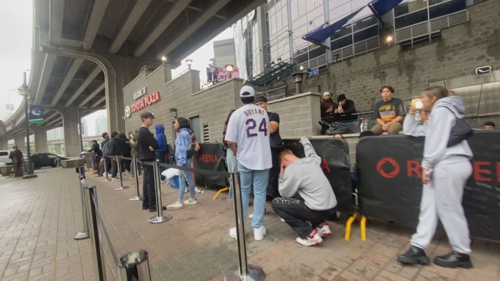 Drake fans wait outside of Rogers Arena