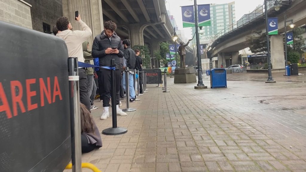 Drake fans wait outside of Rogers Arena