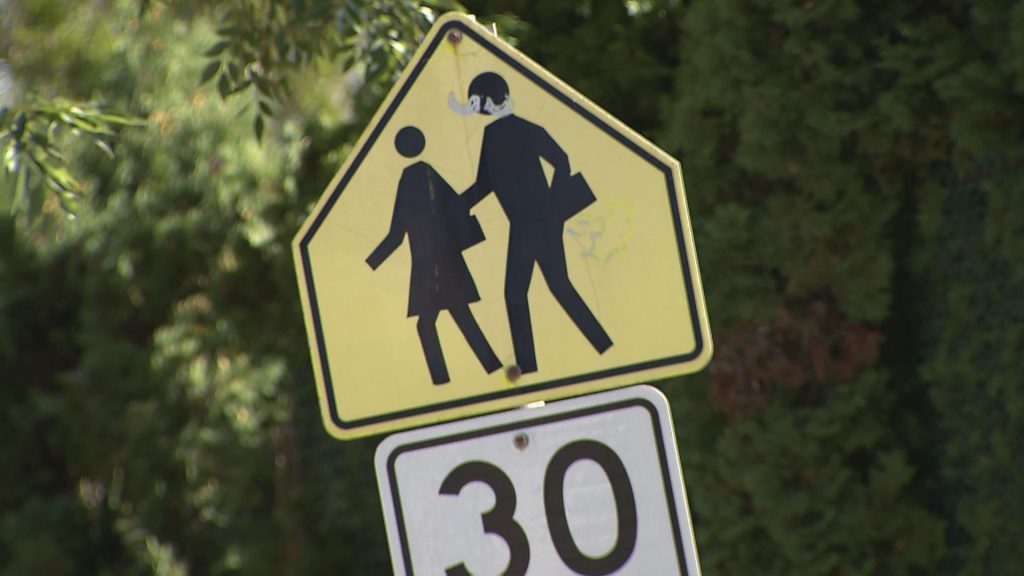 A school zone is seen in Delta reading 30km/h at all times.