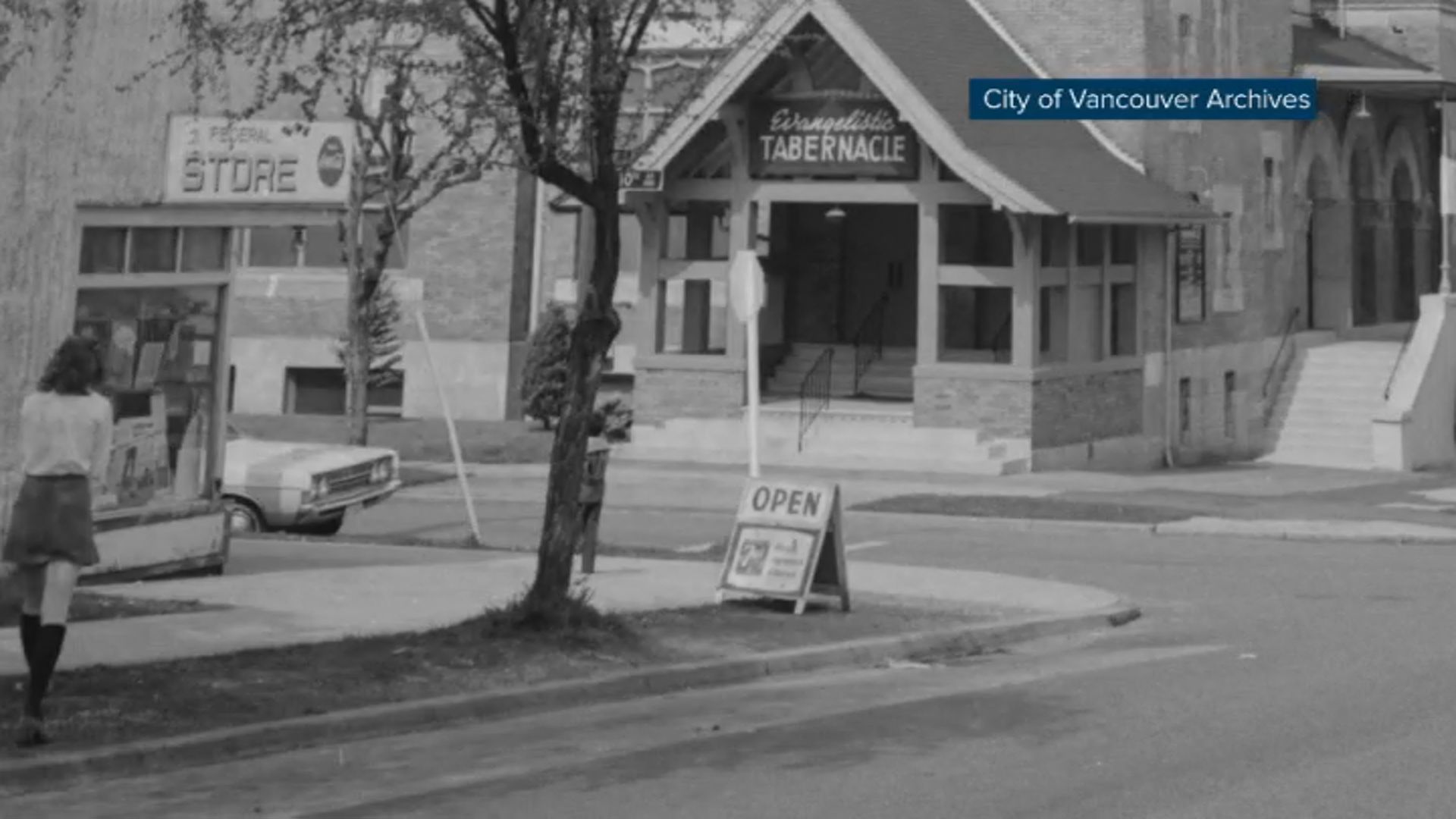 An archived photo of the corner of Quebec Street and East 10th Avenue in Vancouver where an old corner store once was