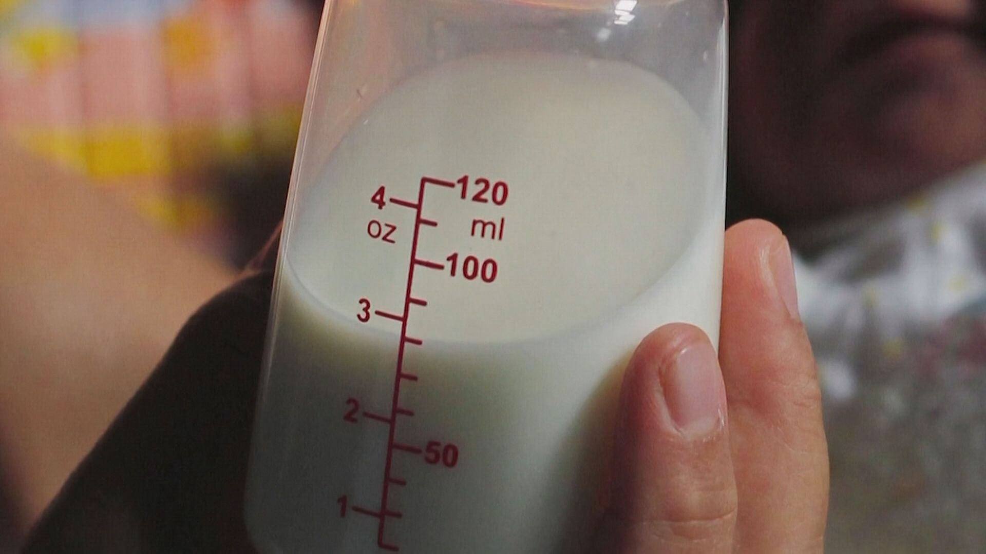 A bottle of milk for a baby.