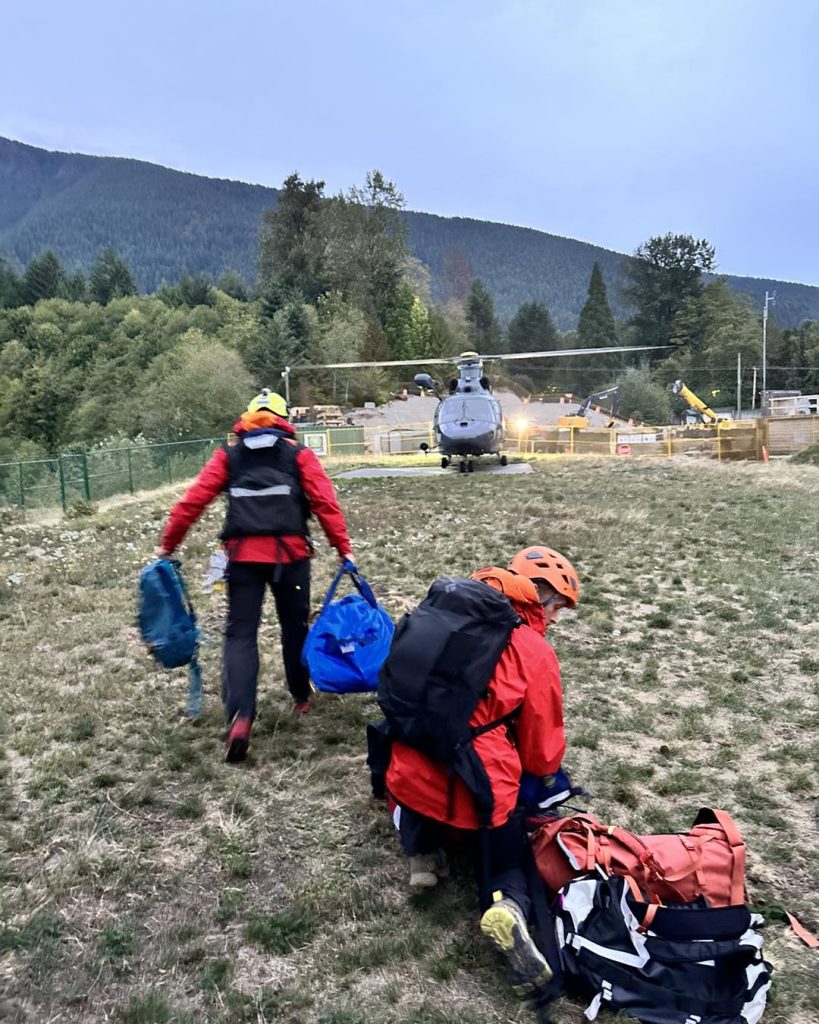 North Shore Rescue crews helping in an air rescue from a mountain on Vancouver Island on Sept. 17, 2023.