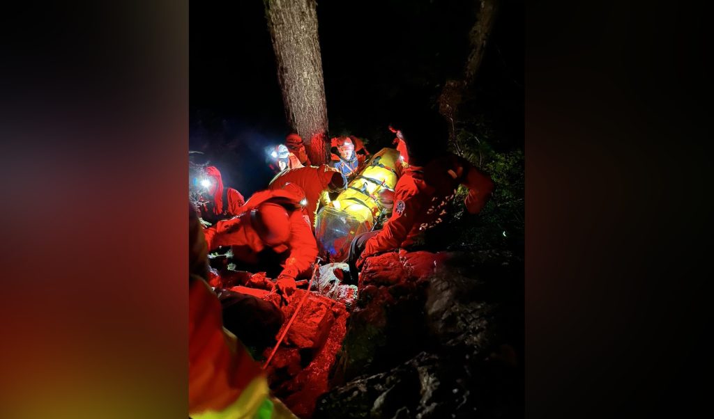 Crews preparing an injured 18-year-old hiker to be air rescued from a Vancouver Island mountain on Sept. 17, 2023.