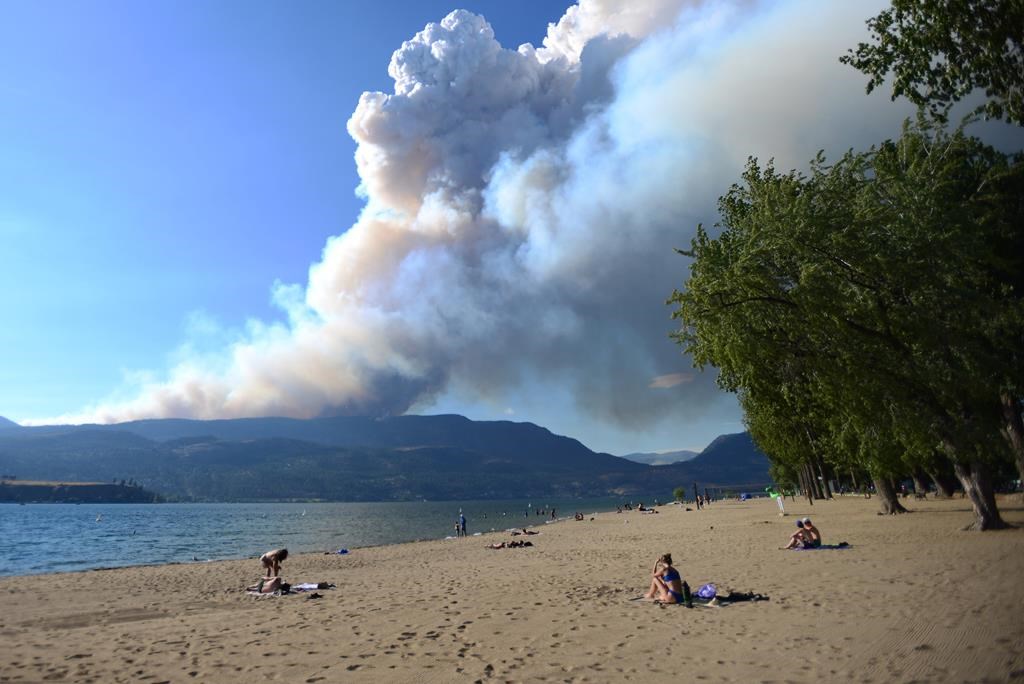 Smoke from the McDougall Creek fire is seen over Okanagan Lake from Kelowna, B.C