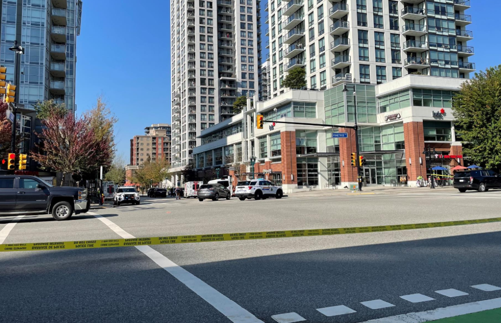 Coquitlam RCMP cruisers block off a street near the area of Pinetree Way and Glen Drive after a major police incident and reported shooting on Friday, Sept. 22, 2023.