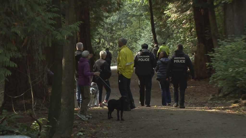 Vancouver Police Officers search for a missing woman near Pacific Spirit Park near the University of British Columbia