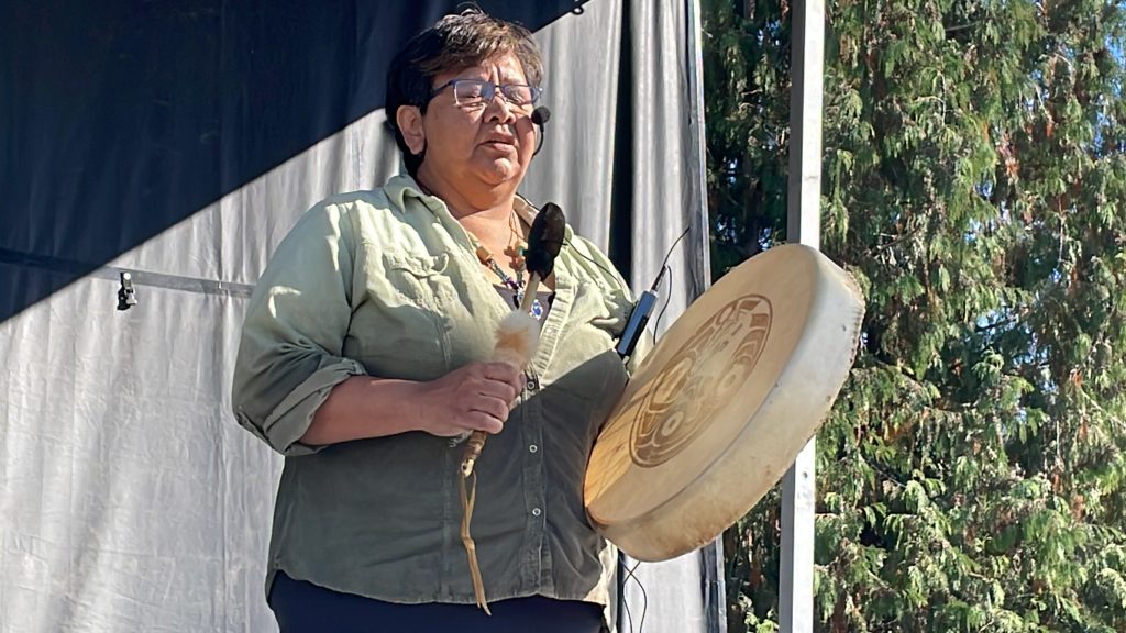 A person drums during a healing ceremony held at Trout Lake Park in East Vancouver on Sept. 30