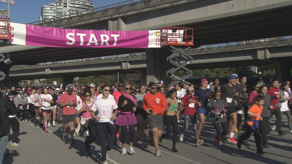 Runners at the start / finish line for the CIBC run for the cure