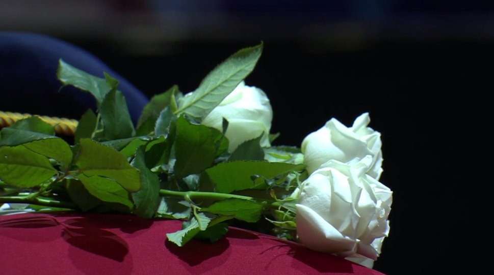 White roses on top of the casket of Ridge Meadows RCMP Const. Rick O'Brien at his regimental funeral in Langley on Oct. 4, 2023.