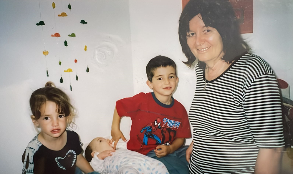 Yoav Shimoni's grandmother Bracha Levinson is pictured with two children.