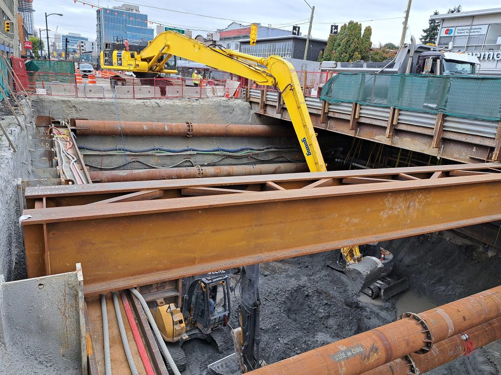 An excavator working on the future Arbutus Station as part of Vancouver's Broadway Subway Project. 