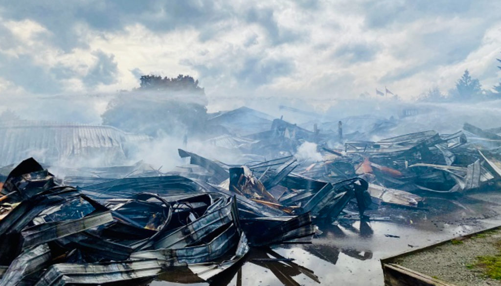 Smoke lingers above the burnt remnants of Hazel Trembath Elementary school in Port Coquitlam.