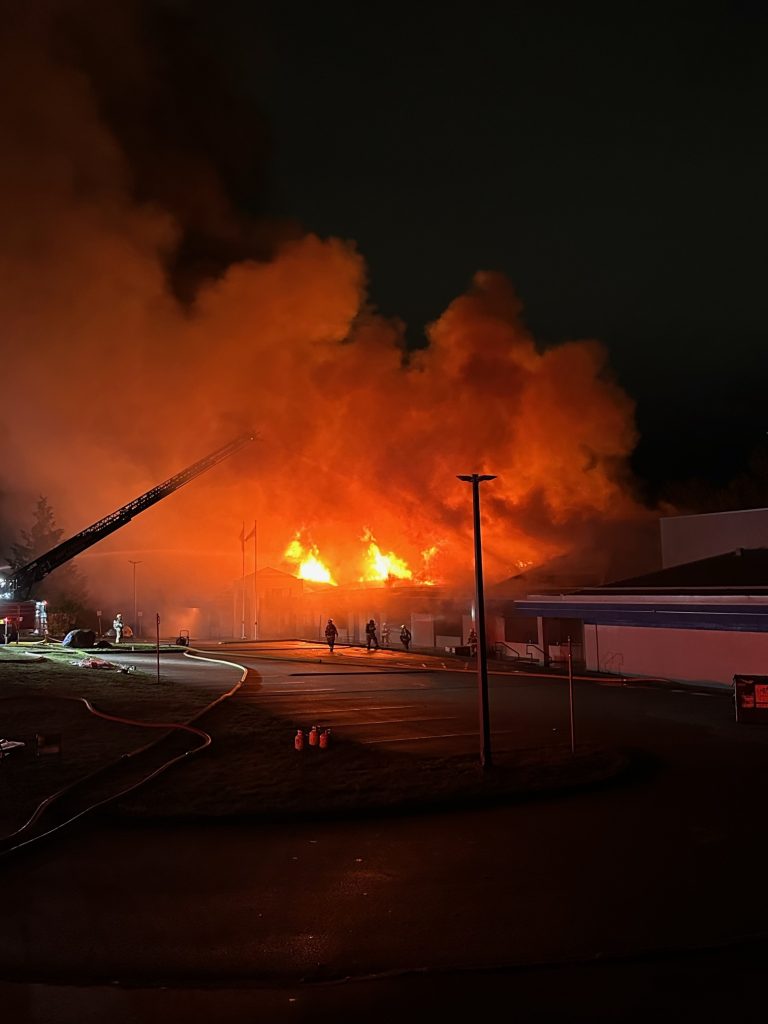 Images posted to social media show the Hazel Trembath Elementary School engulfed in flames. (Supplied, Cole Moffett)