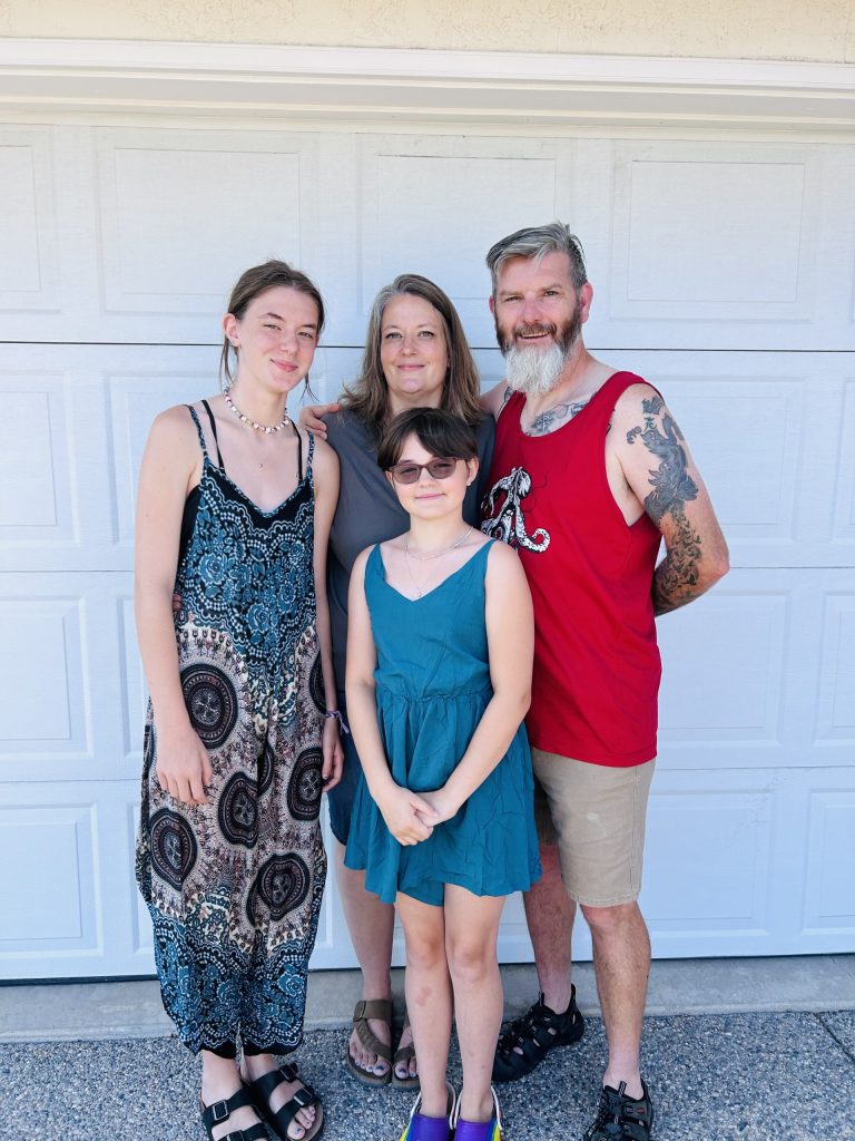 Jen Rollins (middle) and her family, which recently moved to the Sunshine Coast, north of Powell River.