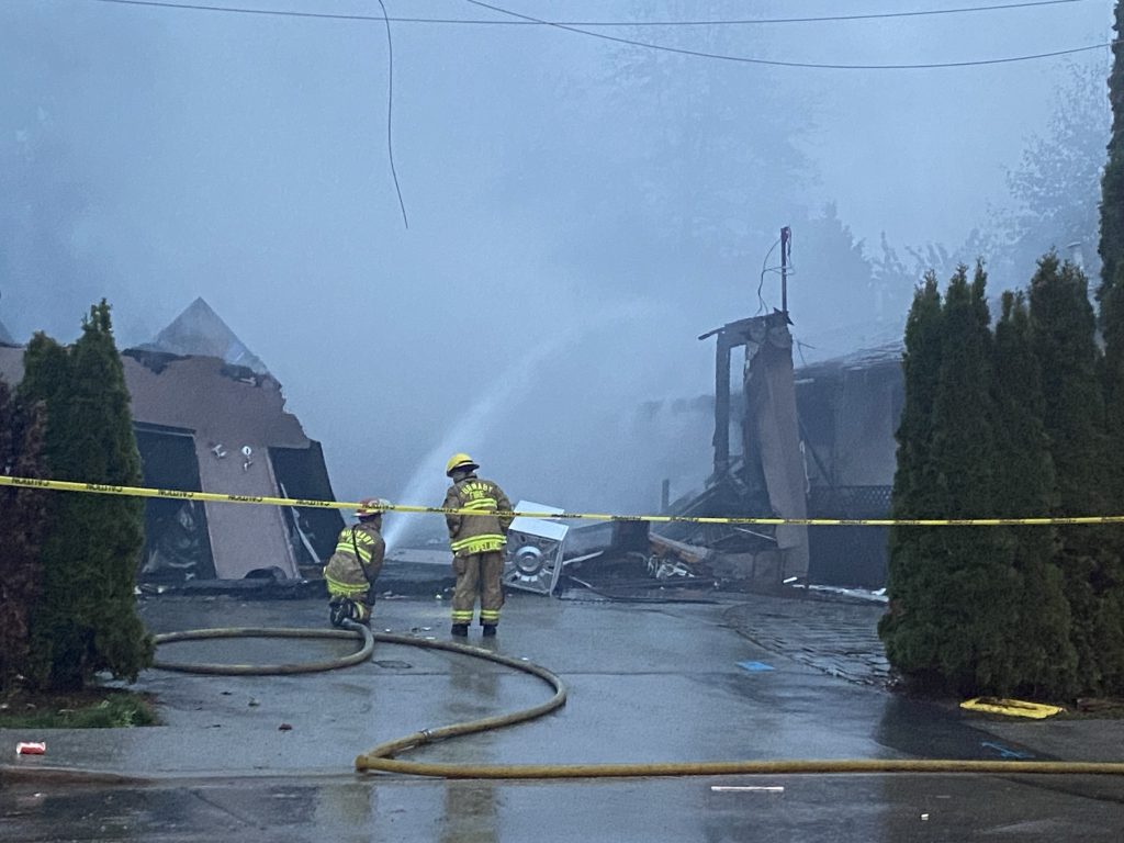 A series of four homes in Burnaby have been badly damaged after an early morning fire tore through the structures Wednesday. (Mike Lloyd / CityNews Image)