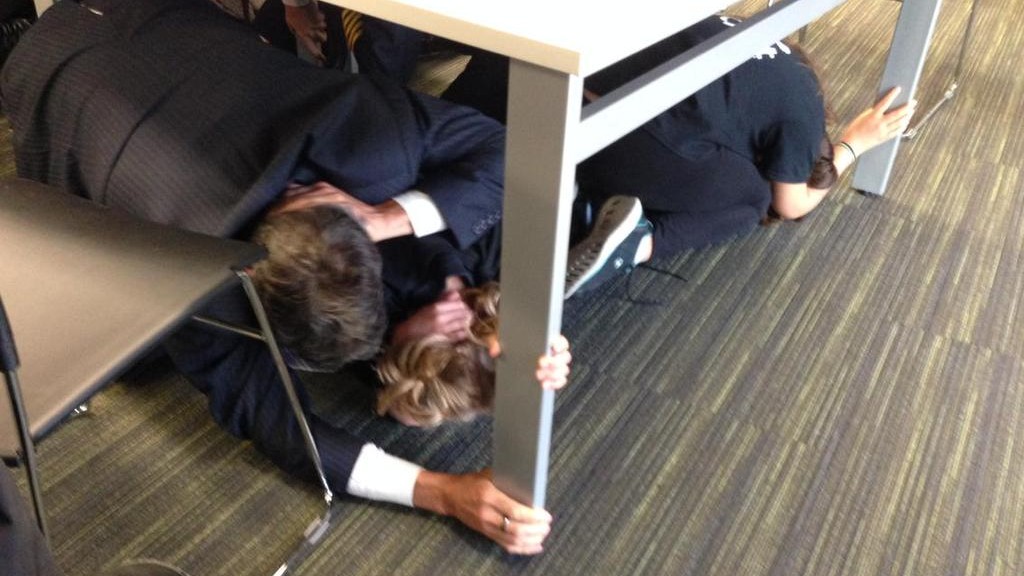 Former Vancouver mayor Gregor Robertson participates in earthquake drill with kids at Vancouver Public Library (Oct 15/15)