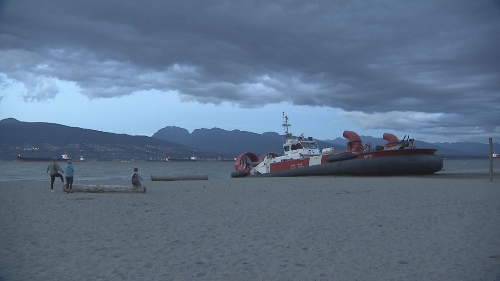 A Coast Guard hovercraft vessel is seen on Spanish Banks