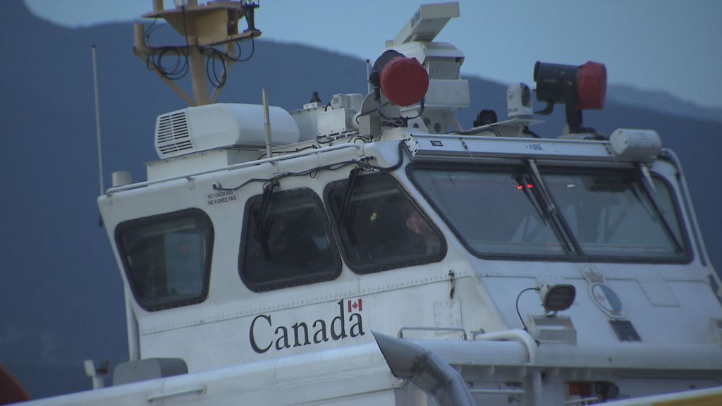 A Coast Guard hovercraft vessel is seen on Spanish Banks