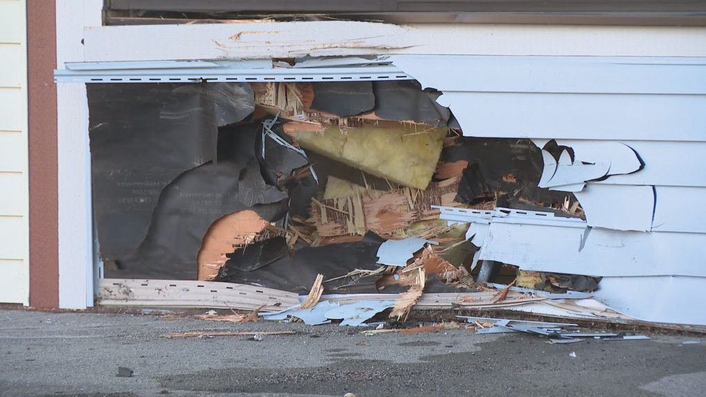 Damage is seen on the outside of the Aldergrove Community RCMP Station.