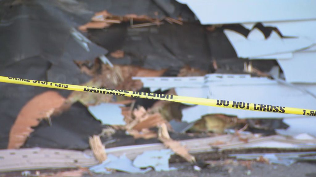 Damage is seen on the outside of the Aldergrove Community RCMP Station.