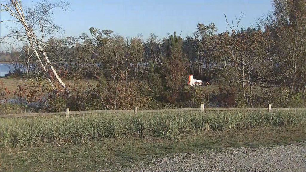 Debris of a plane crash is seen at Blackie Spit Park