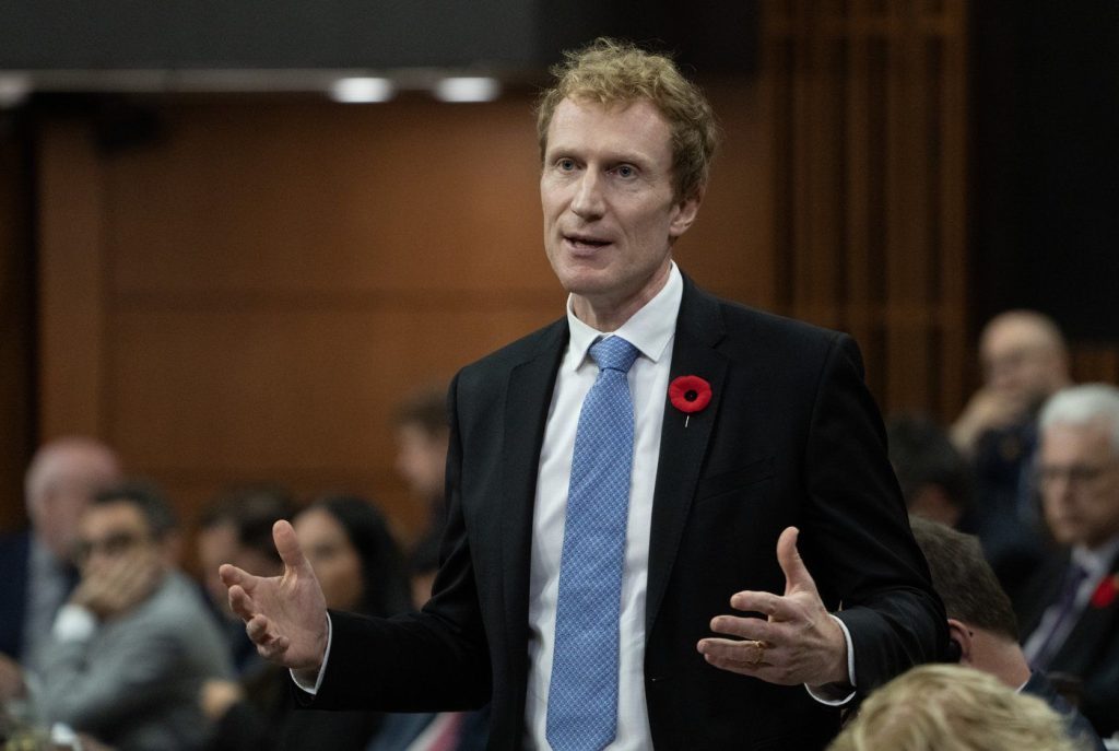 Immigration, Refugees and Citizenship Minister Marc Miller rises during Question Period, in Ottawa, Tuesday, Oct. 31, 2023.