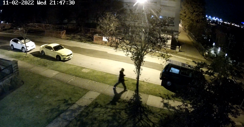 A person believed to be walking away from the scene of a fatal stabbing in East Vancouver is seen in this surveillance footage from the area of Graveley and Renfrew streets on Nov. 2, 2022