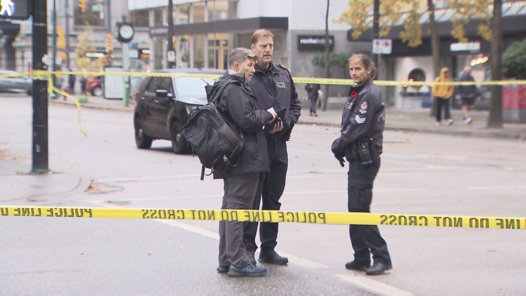 Vancouver Police block the intersection of Howe and West Hastings