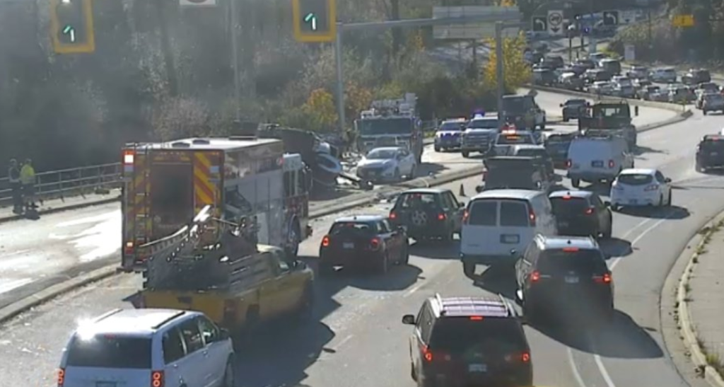 A truck flipped on Mountain Highway south of the Highway 1 overpass Friday afternoon, leading to major delays through the area