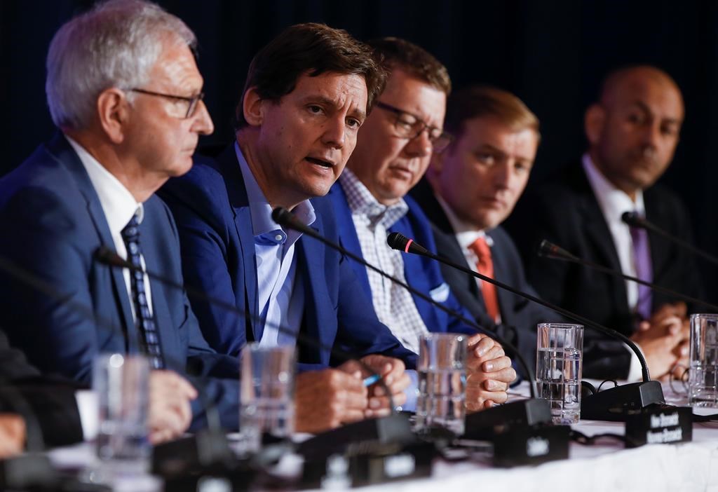 B.C. Premier David Eby, second from left, speaks to media during the closing news conference at the Council of the Federation Canadian premiers meeting at The Fort Garry Hotel in Winnipeg, Wednesday, July 12, 2023. The impact of carbon taxes on mounting cost-of-living pressures across Canada is slated to take centre stage at this week's meeting of the country's 13 premiers and territorial leaders in Halifax.