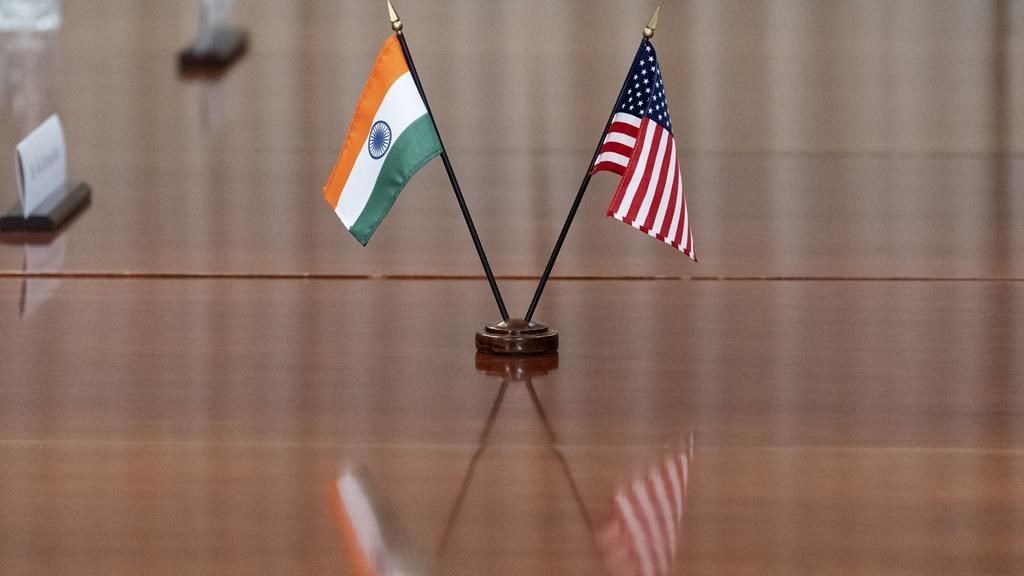 The countries' flags are seen on the table during a meeting with India's Foreign Minister Subrahmanyam Jaishankar and U.S. Secretary of Defense Lloyd Austin at the Pentagon, Monday, Sept. 26, 2022, in Washington.