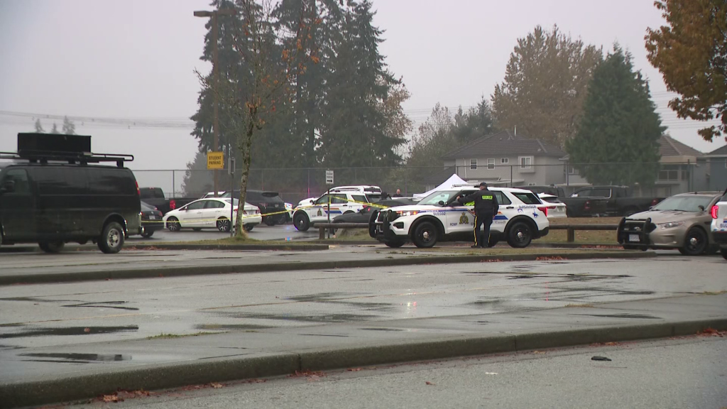 Investigators at the scene of a fatal stabbing outside Tamanawis Secondary School in Surrey on Nov. 22, 2022. (CityNews Image)