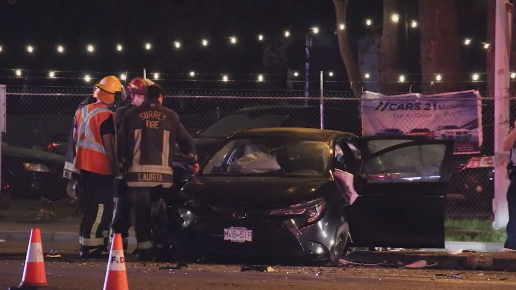 Emergency crews attend a scene in Surrey