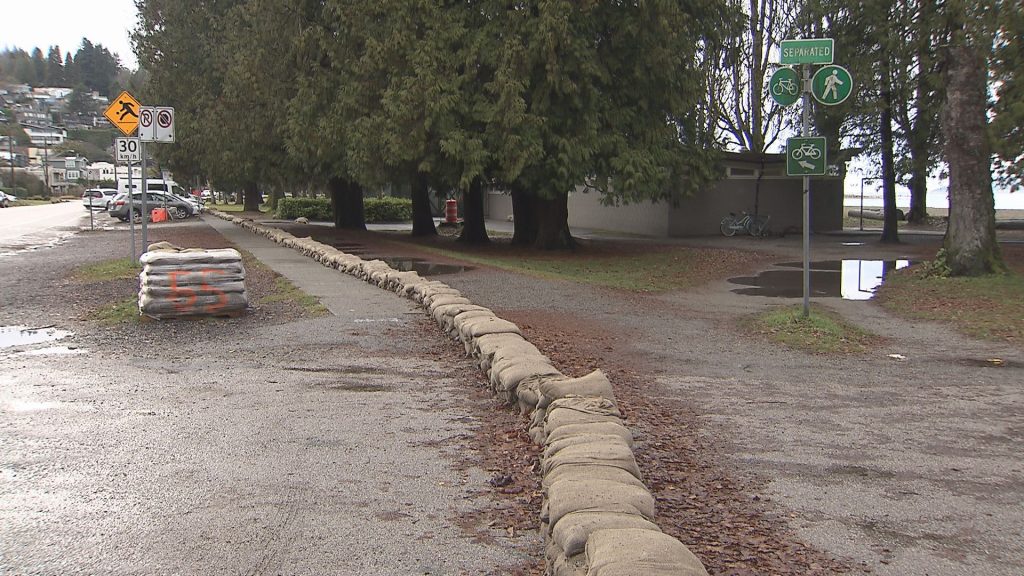 Storm Prep underway in Vancouver with sandbags along the shore